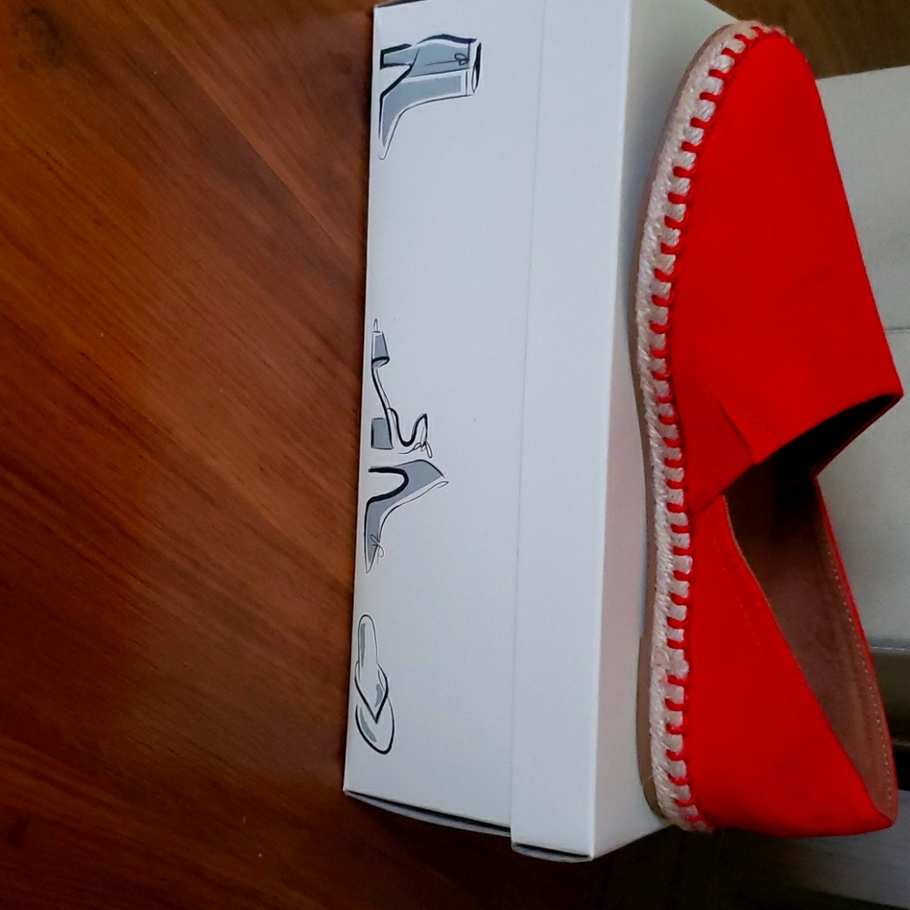 A new day bright red flats.